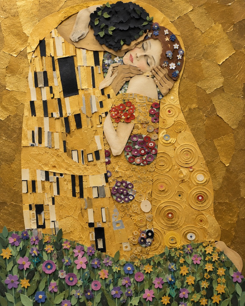 The Kiss recreated as a layered paper-cut collage